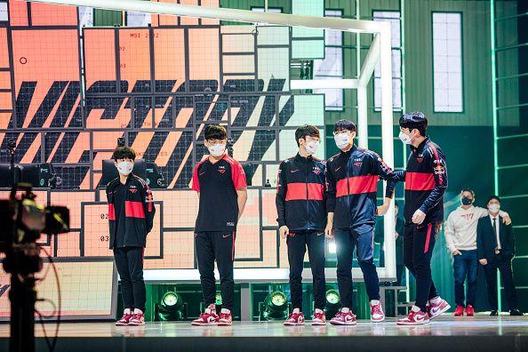 BUSAN, SOUTH KOREA - MAY 28: T1 poses onstage after their victory against G2 Esports at the League of Legends - Mid-Season Invitational Knockouts Stage on May 28, 2022 in Busan, South Korea. (Photo by Colin Young-Wolff/Riot Games via Getty Images)